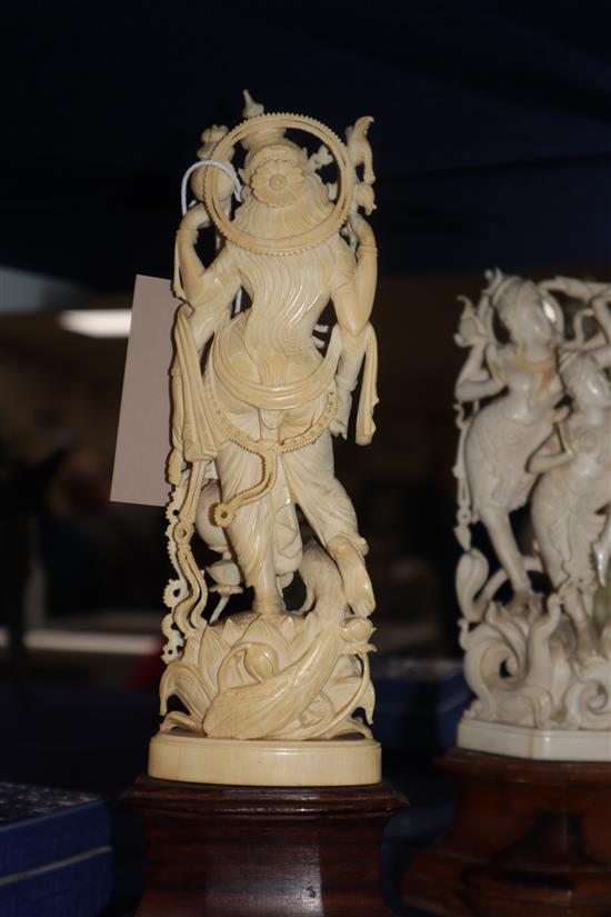 Three Indian ivory carvings on wooden bases Tallest 27cm